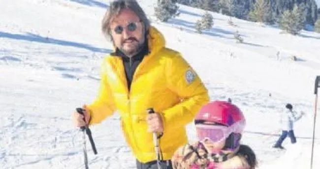 Babalar ve kızları kayakta