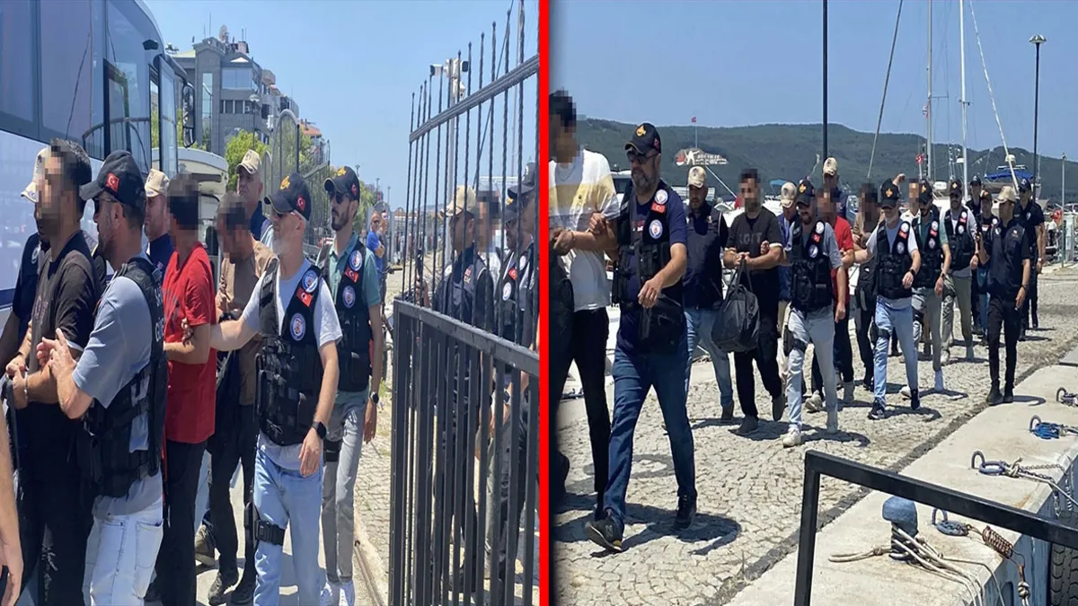 Gökçeada'da FETÖ şüphelilerinin yakalanmasının ardından adliyeye sevk edildikleri an.