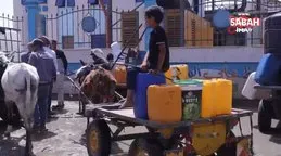 Gazzeliler içme suyu için saatlerce sıra bekliyor