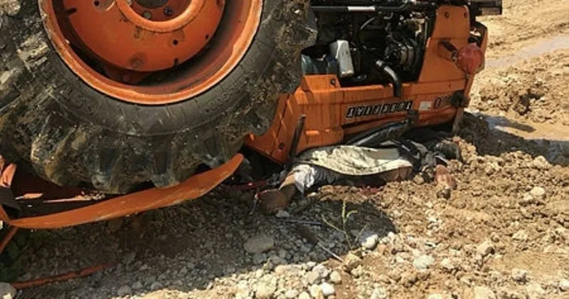 denizli de devrilen traktorun altinda