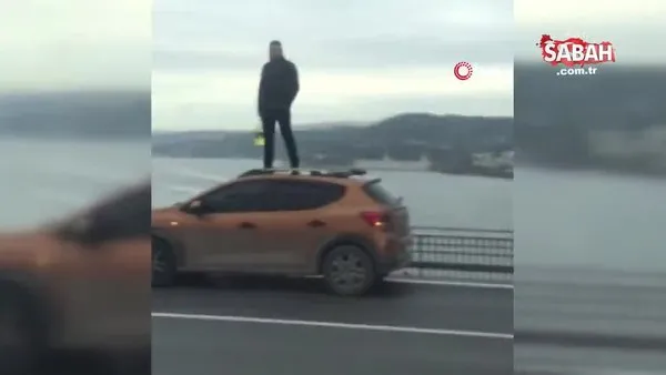 15 Temmuz Şehitler Köprüsü'nde otomobilin üstüne çıkıp benzin döktü, itfaiyeci sayesinde yakalandı | Video
