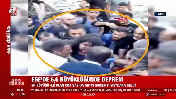 İzmir'de depremde yıkılna binanın enkazında yaralı kadının kurtarılma anı kamerada | Video