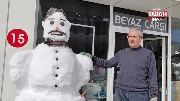 İş yerinin önünde 2 metrelik kardan adam ilgi odağı oldu | Video