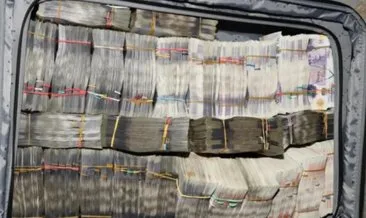 Bavul dolusu parayla yakalandı
