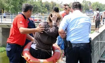 Sulama kanalına atlayan kadını vatandaşlar kurtardı
