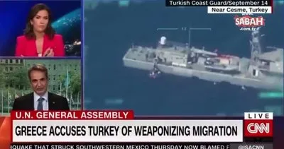 CNN, Kiryakos Miçotakis konuşurken geri itilen göçmenleri gösterdi | Video