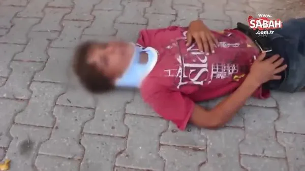 Vicdansız adam bahçesindeki çeşmeden su içmek istedi diye 10 yaşındaki çocuğu sopayla dövdü! | Video