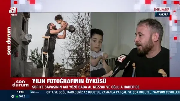 Yılın fotoğrafının öyküsü. Suriyeli baba ve oğlu A Haber'de | Video