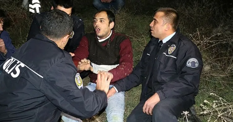 Kayalıklara yuvarlanan alkollü kişi, yardıma gelen polislere taş attı