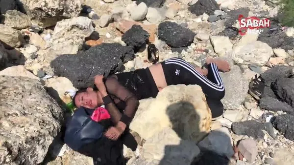Son dakika haberi... Yabancı uyruklu genç kadını dövüp kayalıklara attılar! | Video