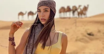 Fit anne Özlem Ada Şahin’in çöl pozları sosyal medyayı salladı! Şarkıcı Berkay ile Özlem Ada Şahin bu kez Dubai’de...