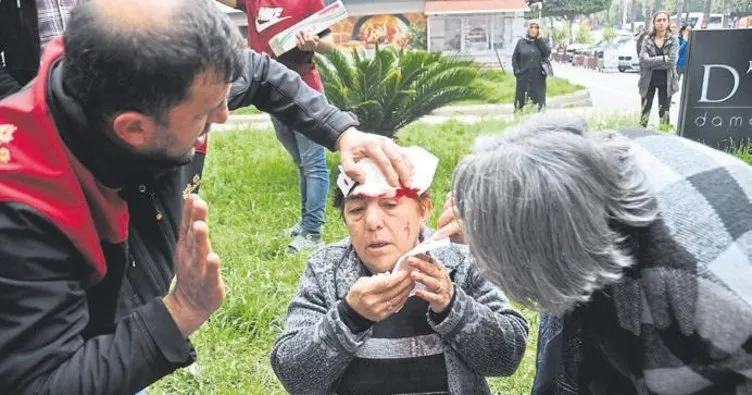 Başına saksı isabet eden kadın yaralandı