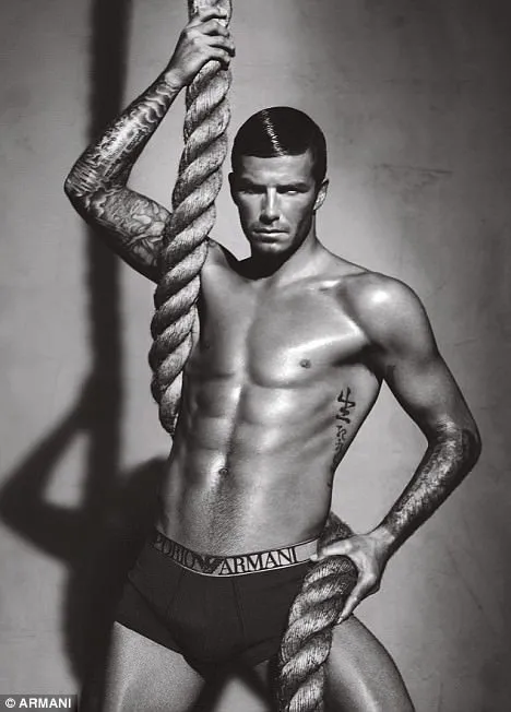 Beckham çifti Armani için kamera karşısında