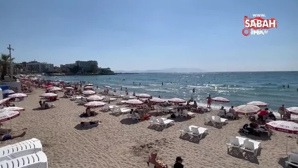 Kuşadası'nda sıcak havada plajlar doldu taştı | Video