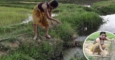 Böyle bir balık avlama yöntemi görülmedi! Sosyal medya bu kadını konuşuyor: Milyonlarca kez izlendi...