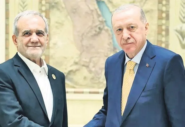 baskan-erdogan-iran-cumhurbaskani-ile-gorustu-1749066740624.jpeg