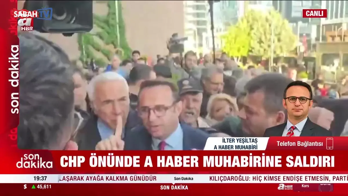 CHP Genel Merkezi önünde A Haber muhabirine çirkin saldırı! videosunu izle CHP Genel Merkezi önünde A Haber muhabirine çirkin saldırı! videosunu izle
