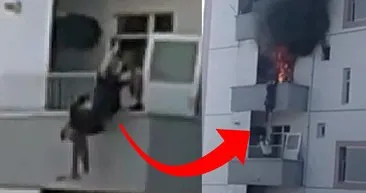 Yangında mahsur kalan kadın balkondan atladı: Alt komşusu havada yakaladı!