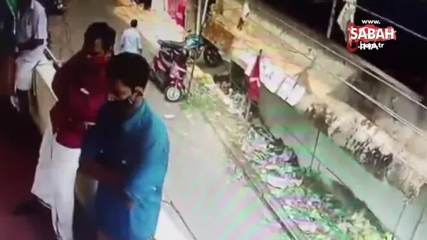 Bayılan adam son anda balkondan düşmekten kurtarıldı | Video