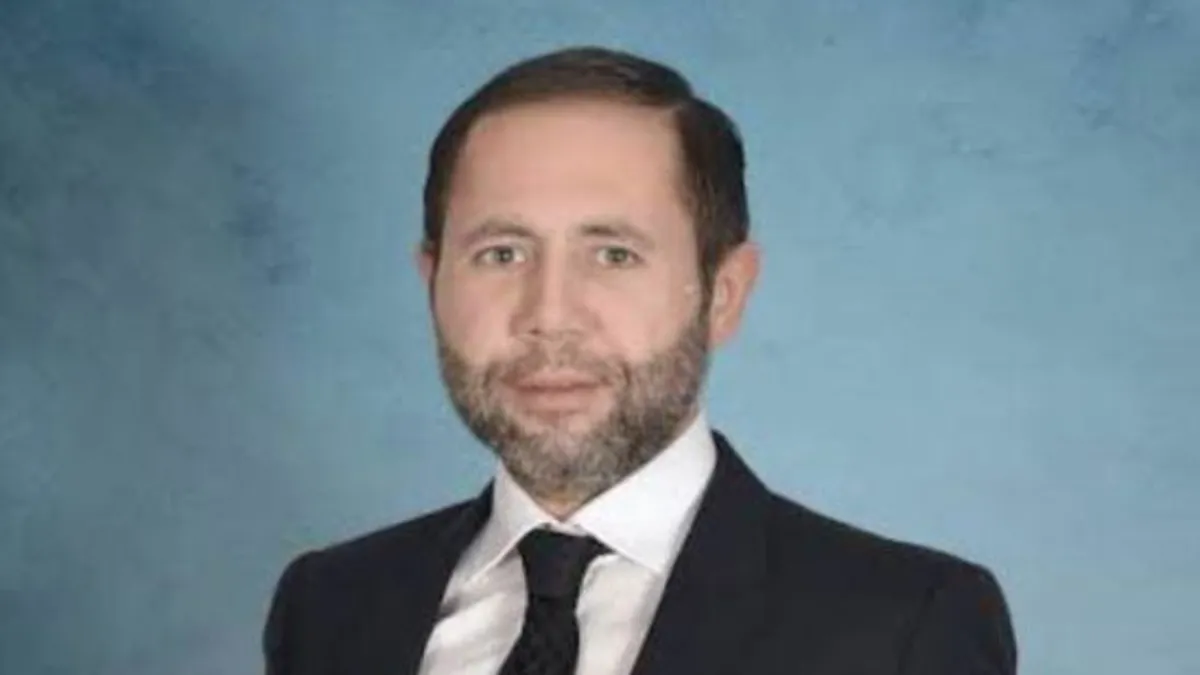 Uçakta olay çıkaran Özcan görevden alındı Uçakta olay çıkaran Özcan görevden alındı