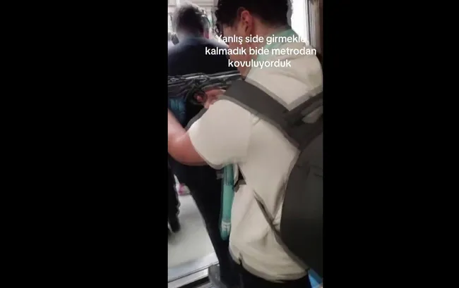 son-dakika-metroda-korku-dolu-anlar-elinde-tufekle-yolculari-tehdit-etti-yetmezmis-gibi-o-anlari-videoya-aldi-1761139148525.jpg