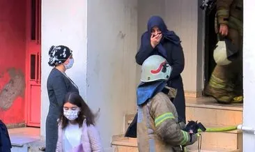 Yangında mahsur kalan 14 kişiyi itfaiye erleri kurtardı #istanbul