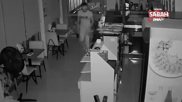 Pişkin hırsız soyduğu iş yerinde çiğ köfte yedi... Hırsız kamerada