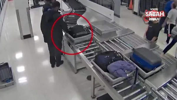 ABD’de havalimanındaki güvenlik görevlisi yolcu çantasından para çaldı | Video
