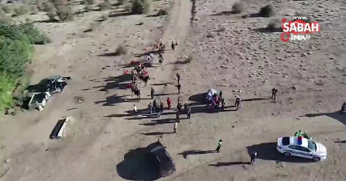 alp kiyafetli turk bayrakli atlilar dinek dagi zirvesinde video