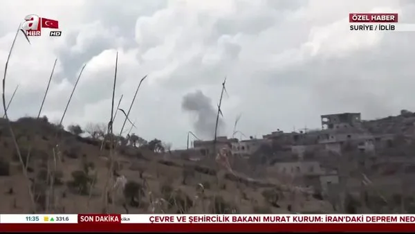 Rejim güçlerinin İdlib'i bombalama anı böyle görüntülendi | Video