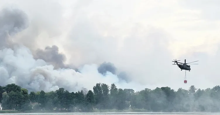 Orman yangınını yağmur söndürdü