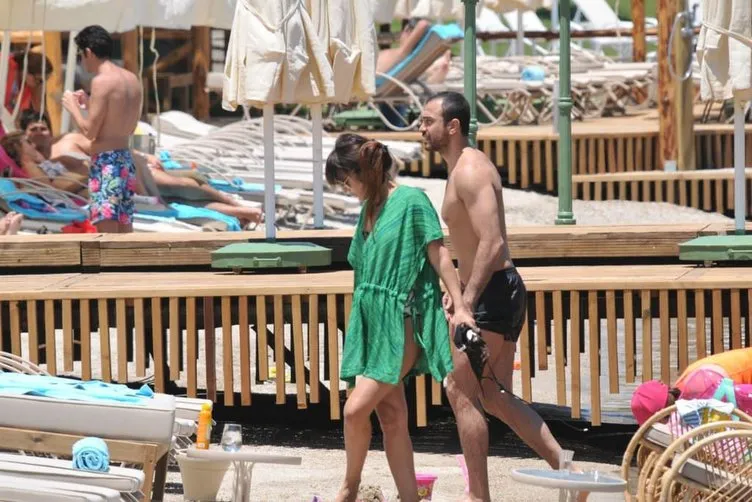 Okan Kurt eşi ve kızının rahat etmesi için plajda bakın ne yaptı