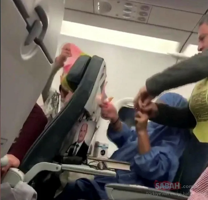 Uçakta sigara içip tişört yakmaya çalışmış; o anlar diğer yolcular tarafından saniye saniye kaydedildi