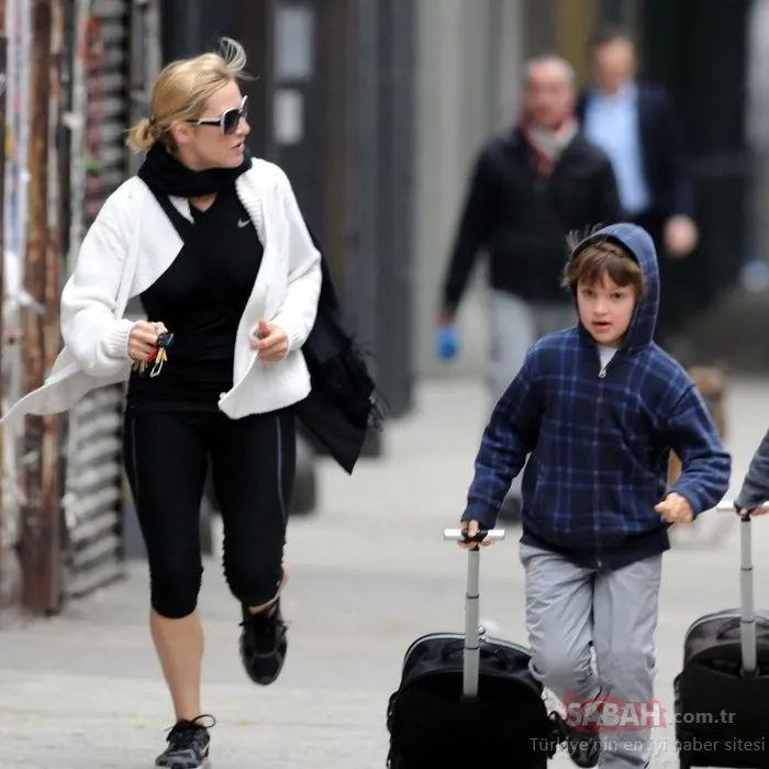 Loved-up Kate Winslet skating to happiness with Ned Rocknroll as they take a wal