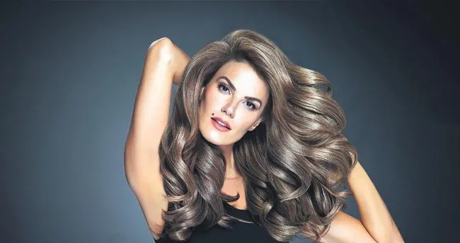 Kıyafetleriyle bin öğrenciye burs verdi