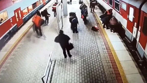 Slovakya'da trenin altına düşen kadın son anda kurtarıldı! Kurallara uymayan kadına 500 Euro para cezası kesildi | Video