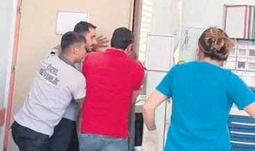 Sağlık çalışanlarına saldırı girişimi kapıyı tutarak engellediler