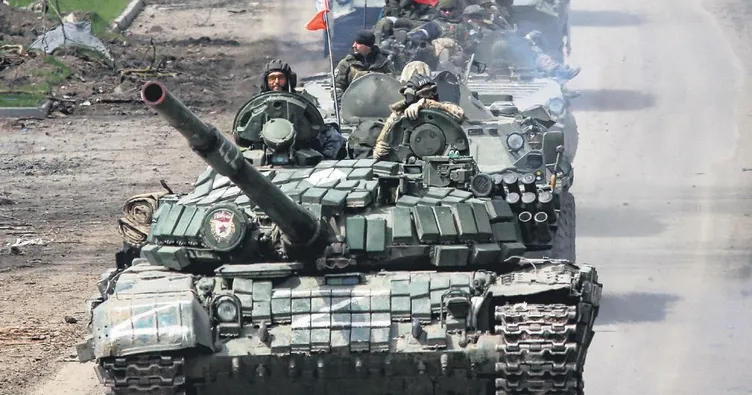 Mariupol’ün dört bir yanı toplu mezar