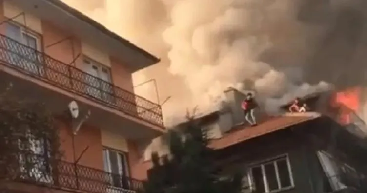 Yangında çatıda mahsur kalan 4 kişiyi itfaiye kurtardı