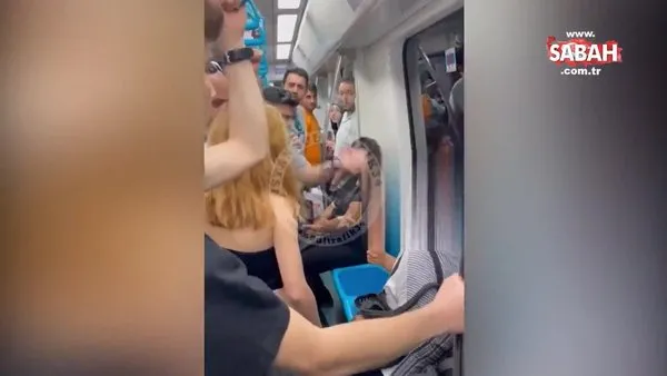 Marmaray'da başörtülü kadına çirkin saldırı: Başörtüsünü çıkarmaya çalıştı, yolcular tepki gösterdi | Video
