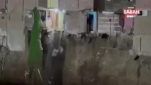 Heyelanda yıkılan evden polisin üzerine derin dondurucu düştü | Video