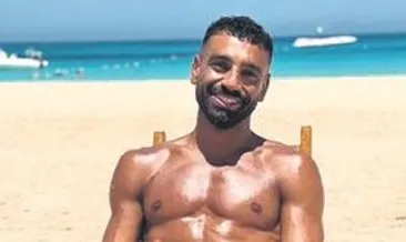 Sahilde fotoğraf kuyruğu