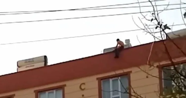 Karısını bıçakladı çatıya çıktı