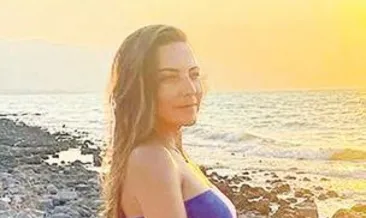 Karnı burnunda pozlarını paylaştı