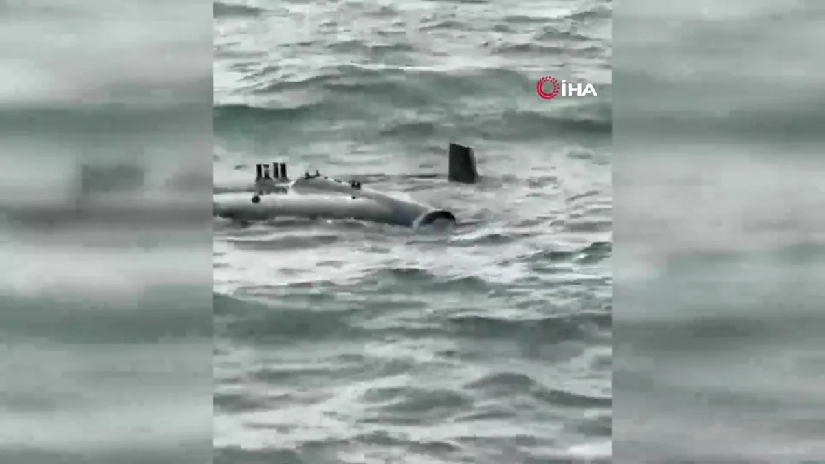 Karaburun açıklarında insansız hava aracı olduğu düşünülen bir cisim bulundu | Video videosunu izle Karaburun açıklarında insansız hava aracı olduğu düşünülen bir cisim bulundu | Video videosunu izle