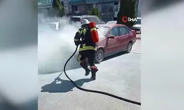 Park halindeki otomobilde çıkan yangını itfaiye ekipleri söndürdü