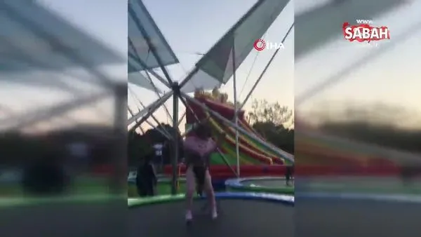 Oyun parkında korkutan anlar: Küçük kız trambolinde zıplarken halat koptu | Video