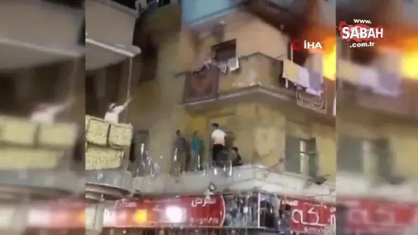 Mısır’da alevlerin ortasında kalan çocuk balkondan atladı | Video