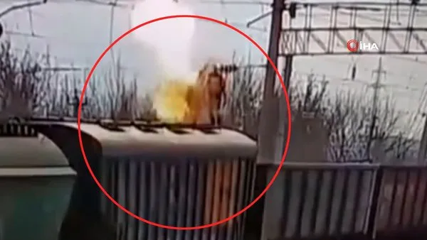 Trenin üzerine çıkan çocuğun elektrik akımına kapılarak feci şekilde öldüğü anlar kamerada | Video