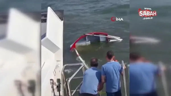 İzmir Körfezi’nde teknesi alabora olan amatör denizci böyle kurtarıldı | Video